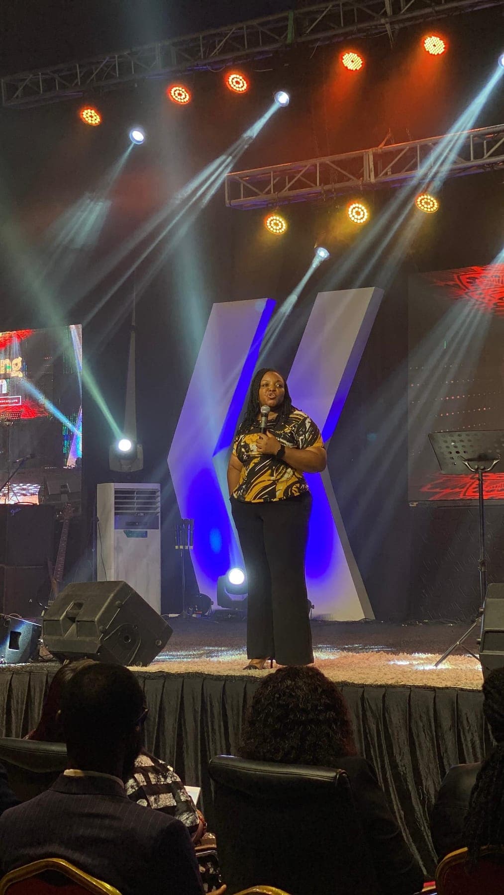 Ibelema Greene speaking on stage